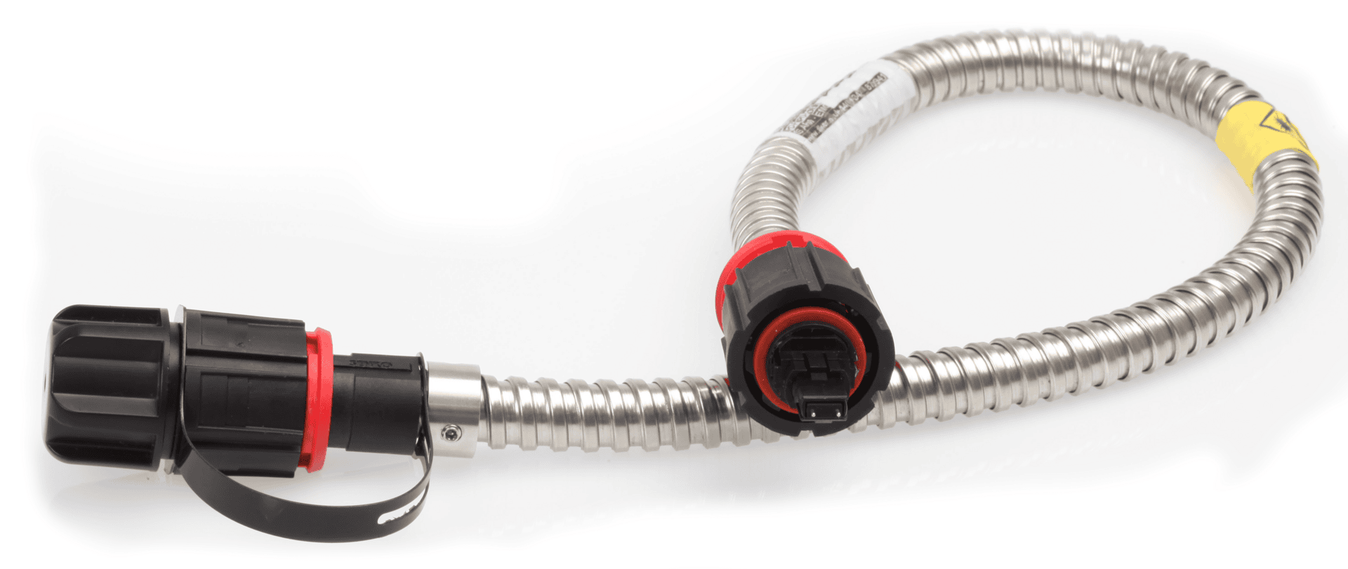 A coiled, metal-braided cable with a product label and a yellow band. The cable terminates in a black connector with a red collar and a protective cap attached by a strap.